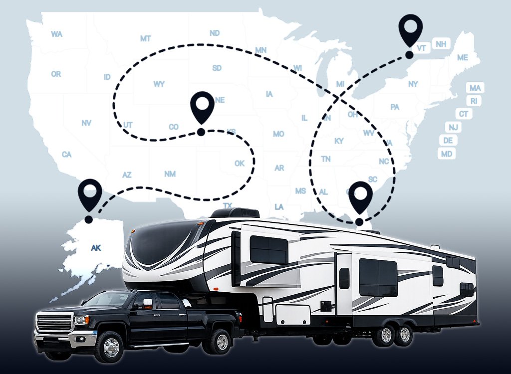 Heavy-duty pickup truck towing a luxury fifth wheel RV trailer for nationwide transportation services